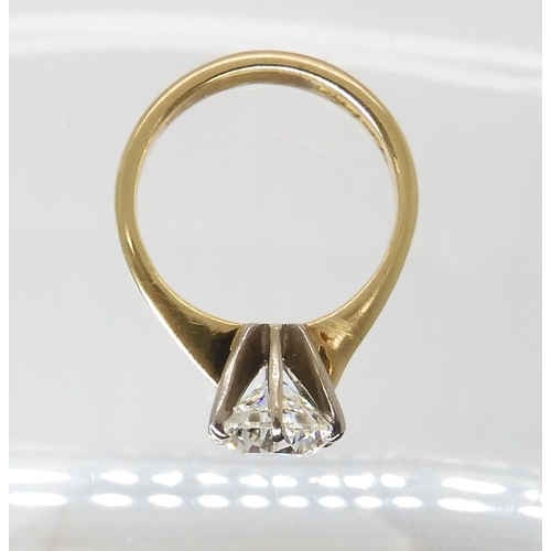 708 - AN 18CT YELLOW AND WHITE GOLD DIAMOND SOLITAIRE