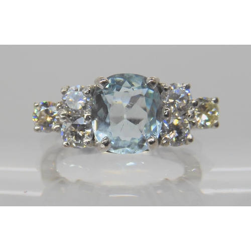 715A - AN 18CT WHITE GOLD AQUAMARINE AND DIAMOND RING