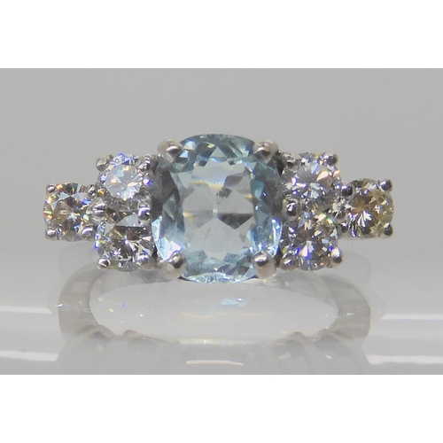 715A - AN 18CT WHITE GOLD AQUAMARINE AND DIAMOND RING