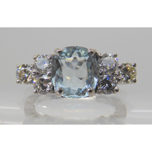 715A - AN 18CT WHITE GOLD AQUAMARINE AND DIAMOND RING