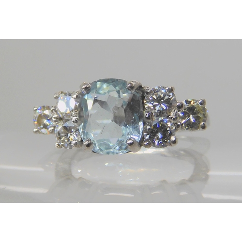 715A - AN 18CT WHITE GOLD AQUAMARINE AND DIAMOND RING