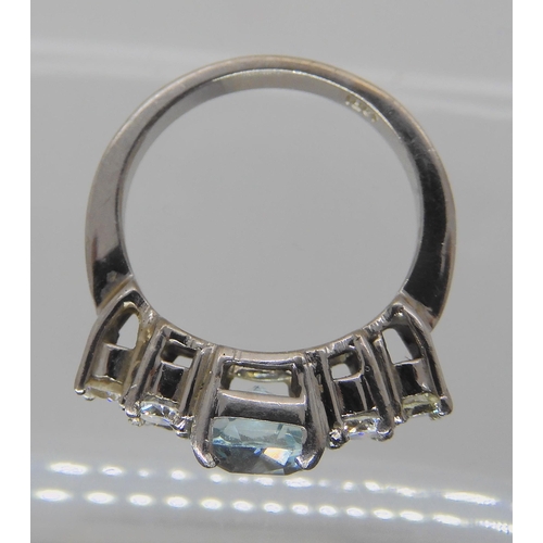 715A - AN 18CT WHITE GOLD AQUAMARINE AND DIAMOND RING