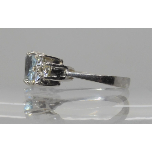 715A - AN 18CT WHITE GOLD AQUAMARINE AND DIAMOND RING