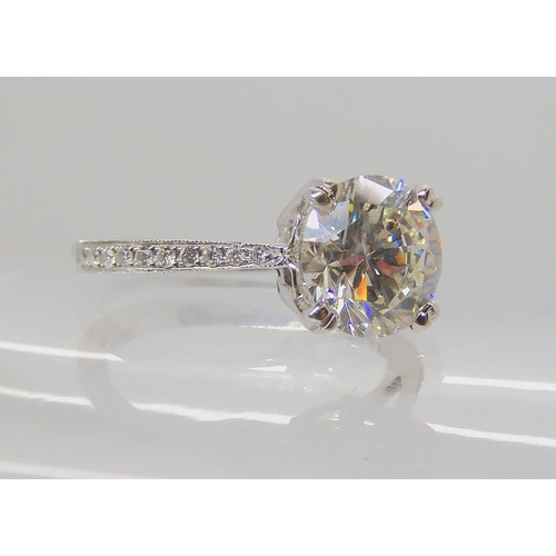 719 - AN 18CT WHITE GOLD DIAMOND SOLITAIRE RING