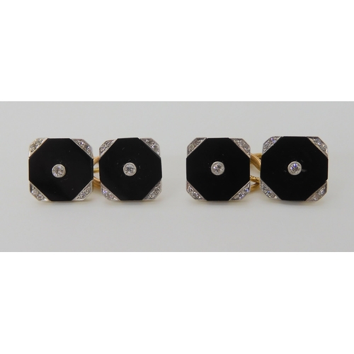 720 - A PAIR OF 18K AND PLATINUM ONYX AND DIAMOND CUFFLINKS