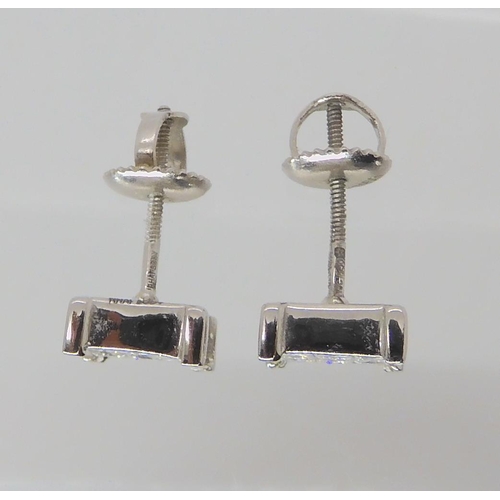 722A - A PAIR OF PLATINUM PRINCESS CUT DIAMOND EARRINGS