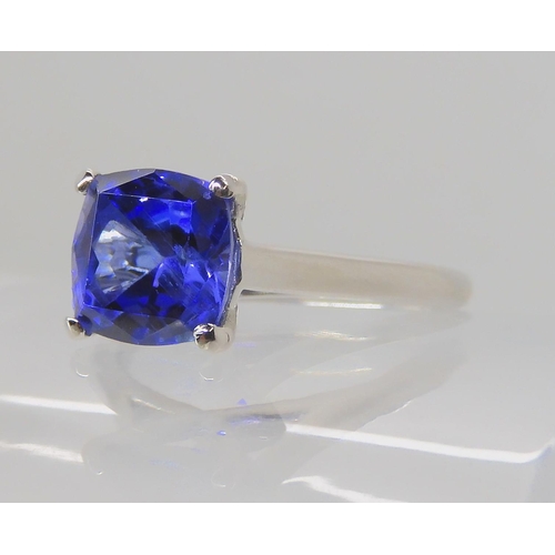 722B - A PLATINUM AND TANZANITE RING