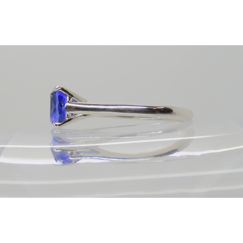 722B - A PLATINUM AND TANZANITE RING