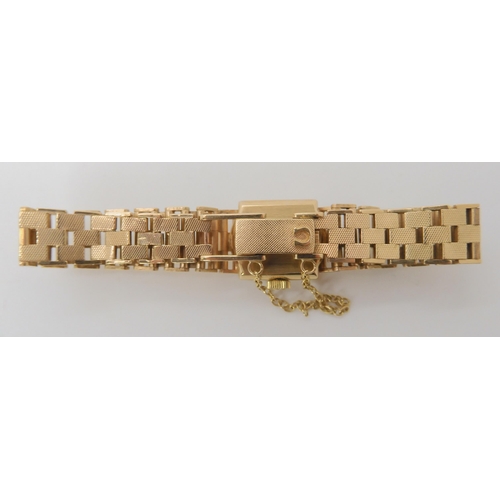 778 - A LADIES 9CT GOLD RETRO OMEGA WRISTWATCH