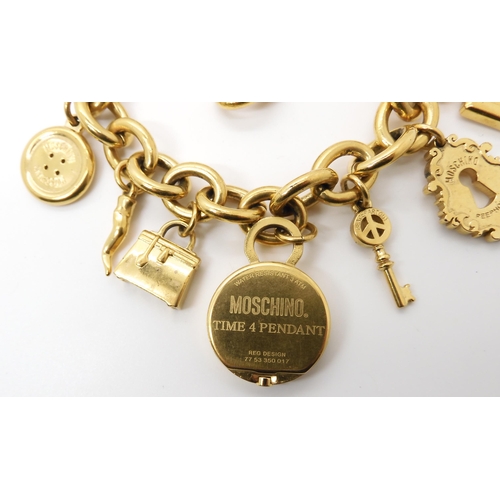 782 - A MOSCHINO TIME PENDANT WATCH BRACELET