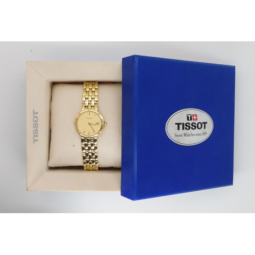 783 - AN 18CT GOLD LADIES TISSOT WRISTWATCH