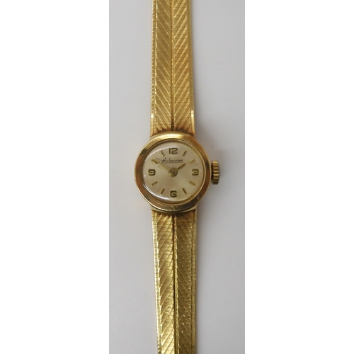 784 - A LADIES 14K GOLD HABMANN WRISTWATCH