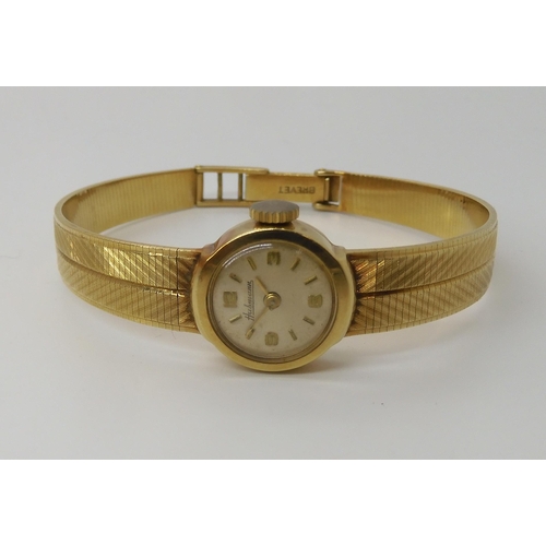 784 - A LADIES 14K GOLD HABMANN WRISTWATCH