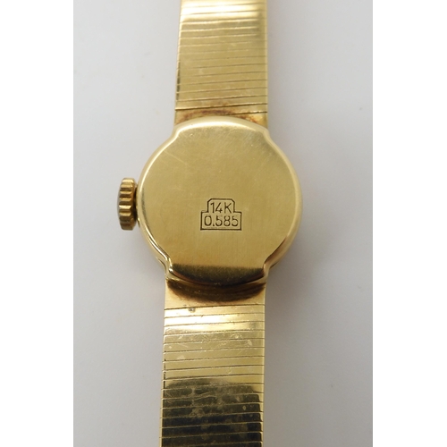 784 - A LADIES 14K GOLD HABMANN WRISTWATCH