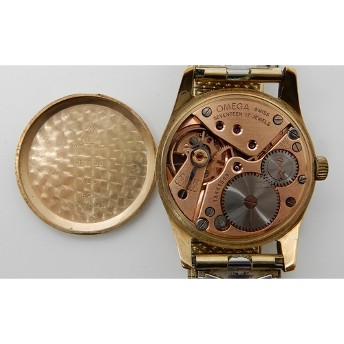 802 - A 9CT GOLD OMEGA WATCH HEAD