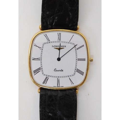 811 - AN 18CT GOLD SLIMLINE LONGINES QUARTZ WRISTWATCH