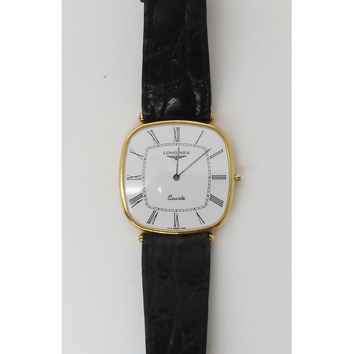 811 - AN 18CT GOLD SLIMLINE LONGINES QUARTZ WRISTWATCH