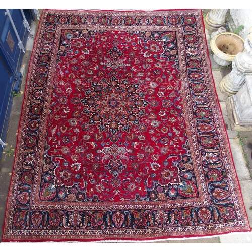 102 - A RED GROUND KESHAN RUG