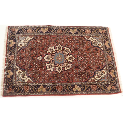 103 - A PINK GROUND ASFAHAN RUG