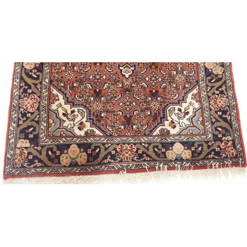 103 - A PINK GROUND ASFAHAN RUG