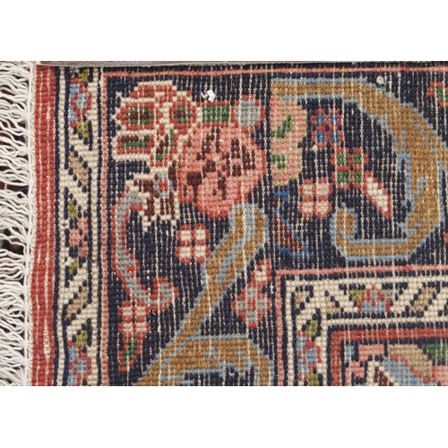 103 - A PINK GROUND ASFAHAN RUG