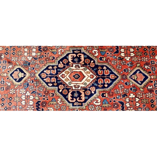 104 - A PINK GROUND EASTERN RUG