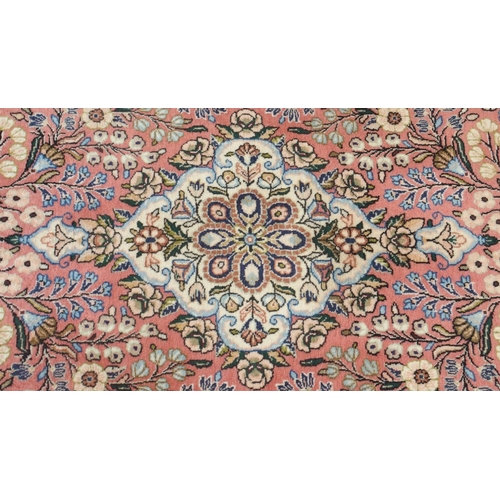 105 - A PINK GROUND EASTERN RUG