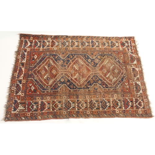 109 - A RED GROUND CAUCASIAN RUG