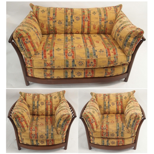 124 - AN ERCOL RENAISSANCE THREE PIECE SUITE