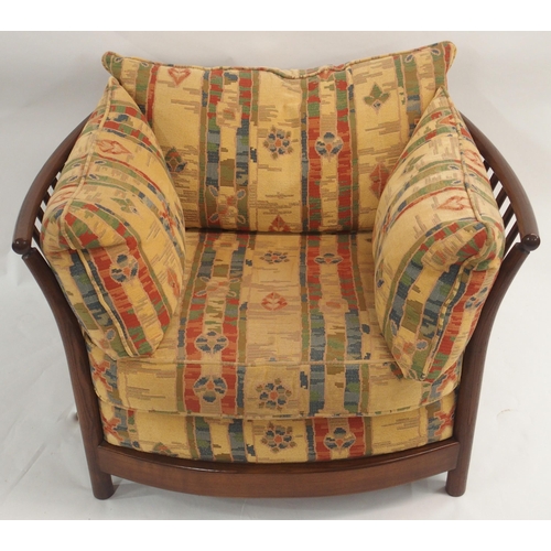 124 - AN ERCOL RENAISSANCE THREE PIECE SUITE