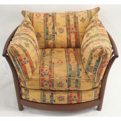 124 - AN ERCOL RENAISSANCE THREE PIECE SUITE