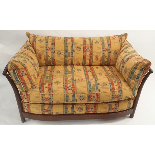 124 - AN ERCOL RENAISSANCE THREE PIECE SUITE