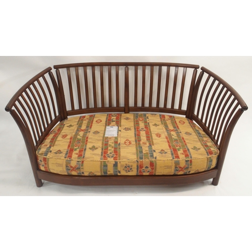 124 - AN ERCOL RENAISSANCE THREE PIECE SUITE