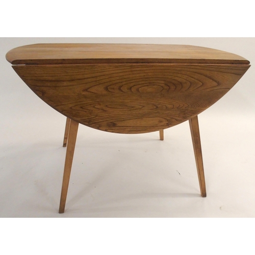 127 - AN ERCOL DROP LEAF TABLE WITH TAPERED LEGS