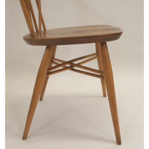 127 - AN ERCOL DROP LEAF TABLE WITH TAPERED LEGS