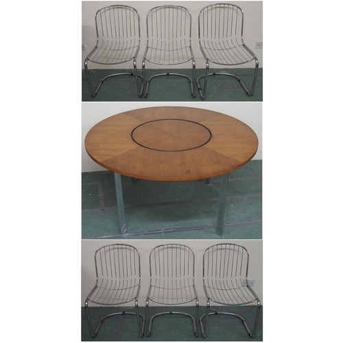 127A - A MERROW ASSOCIATES TEAK CIRCULAR TABLE ON STEEL LEGS WITH INTEGRAL LAZY SUSAN