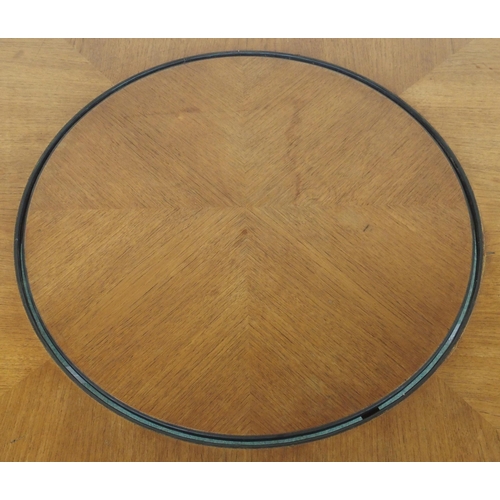 127A - A MERROW ASSOCIATES TEAK CIRCULAR TABLE ON STEEL LEGS WITH INTEGRAL LAZY SUSAN