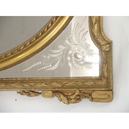 51 - A LOUIS XVI STYLE GILTWOOD AND GESSO WALL MIRROR