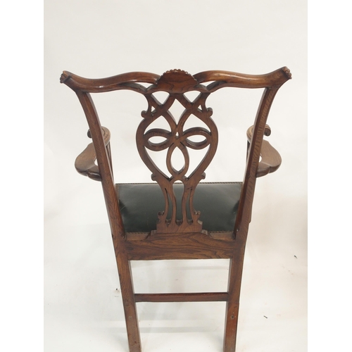 63 - A VICTORIAN OAK CORNER ARMCHAIR