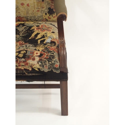 69 - A GEORGIAN STYLE MAHOGANY UPHOLSTERED ARMCHAIR