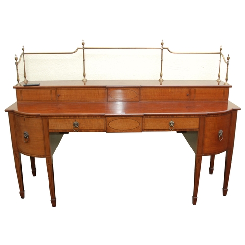 81 - A MAHOGANY  SATINWOOD AND EBONY LINED BREAKFRONT SIDEBOARD