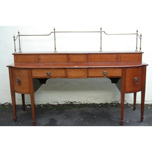 81 - A MAHOGANY  SATINWOOD AND EBONY LINED BREAKFRONT SIDEBOARD