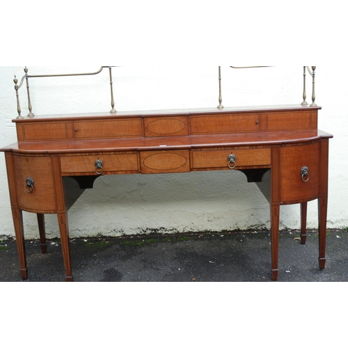 81 - A MAHOGANY  SATINWOOD AND EBONY LINED BREAKFRONT SIDEBOARD