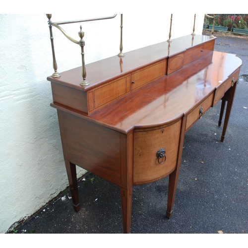 81 - A MAHOGANY  SATINWOOD AND EBONY LINED BREAKFRONT SIDEBOARD