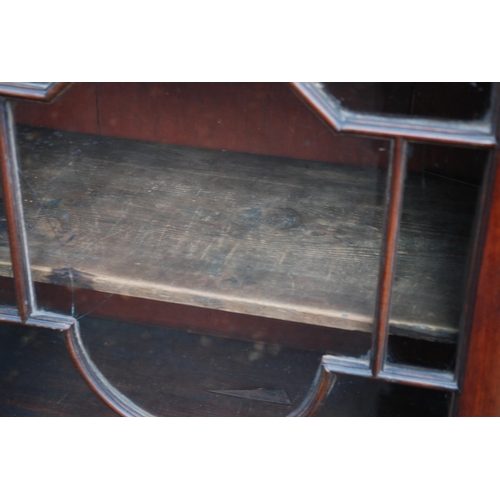 85 - A MAHOGANY BREAKFRONT BOOKCASE