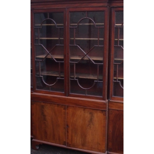 85 - A MAHOGANY BREAKFRONT BOOKCASE