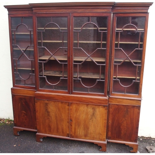 85 - A MAHOGANY BREAKFRONT BOOKCASE