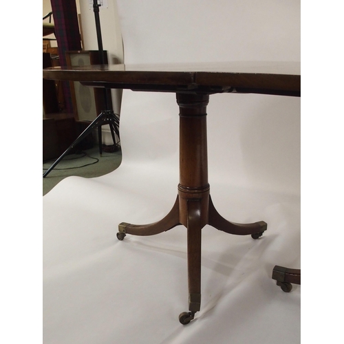 86 - A MAHOGANY D-END DINING TABLE