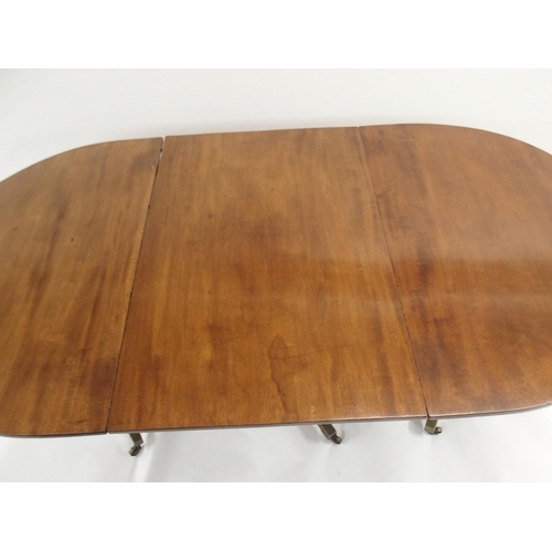 86 - A MAHOGANY D-END DINING TABLE