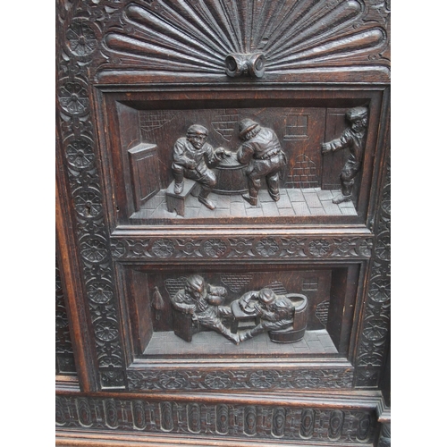 88 - A FLEMISH OAK HALL CUPBOARD